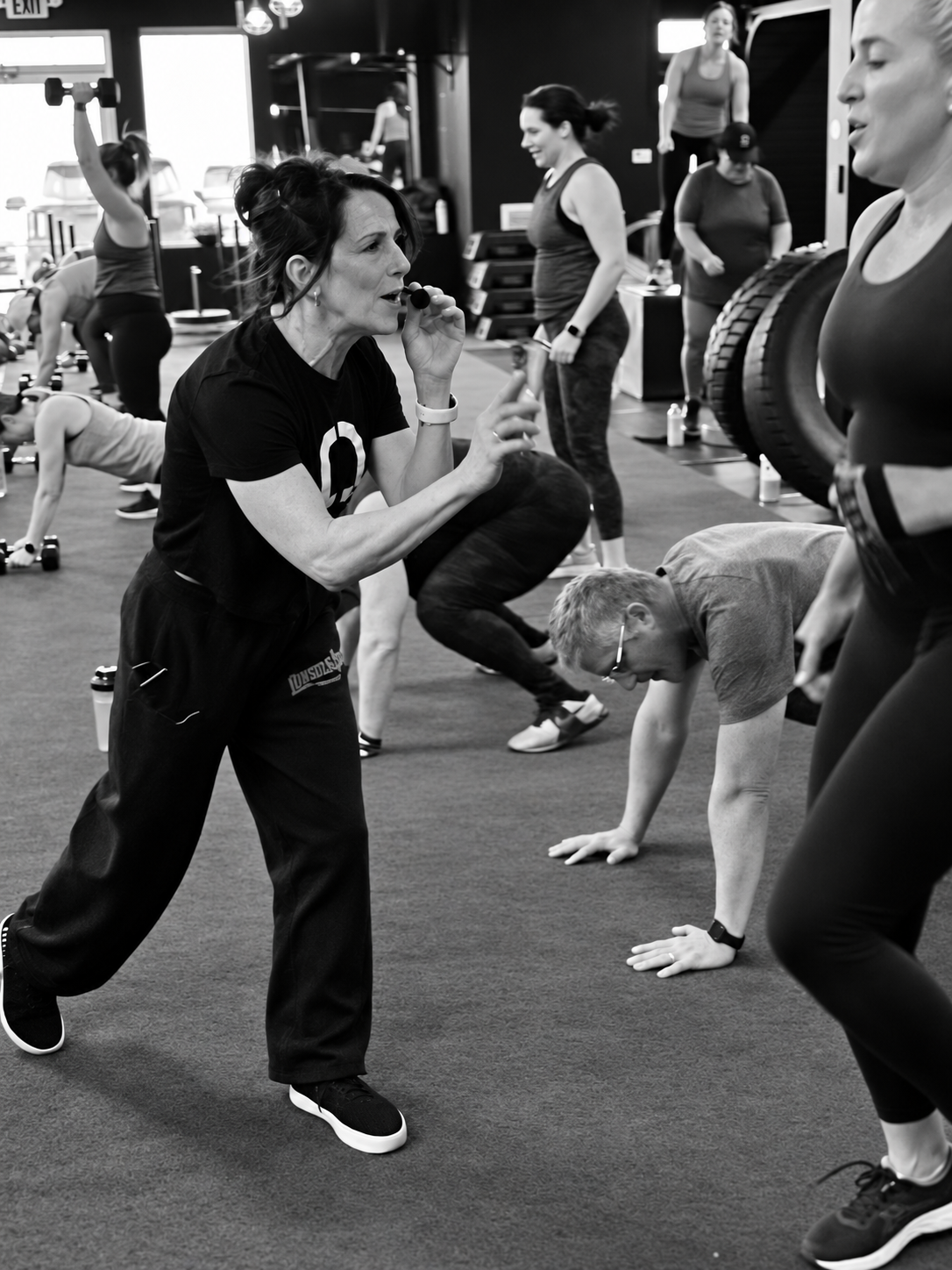 Fitness Artist coach Racquel coaching members through a session