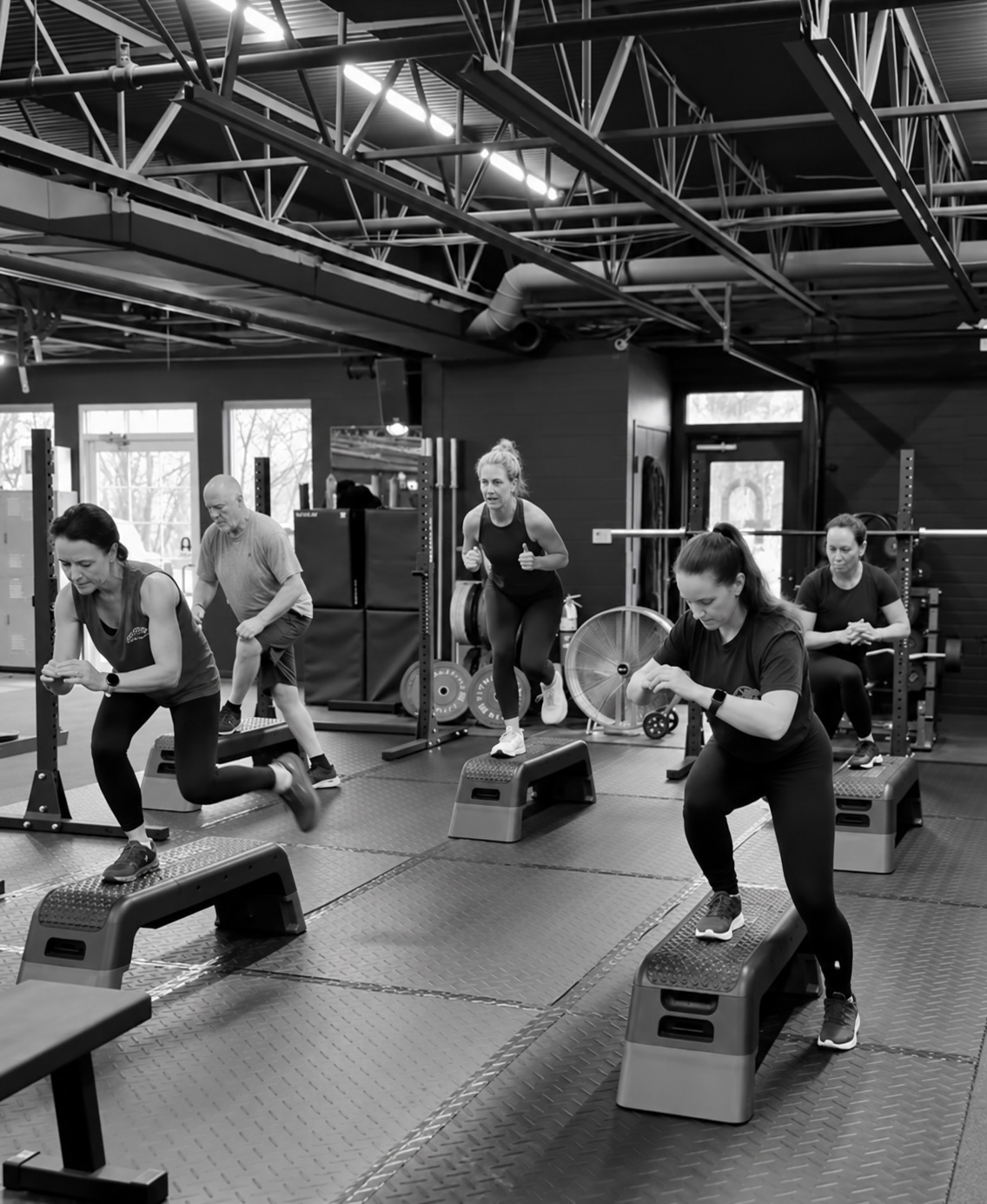 Members working through a coached SWEAT session together