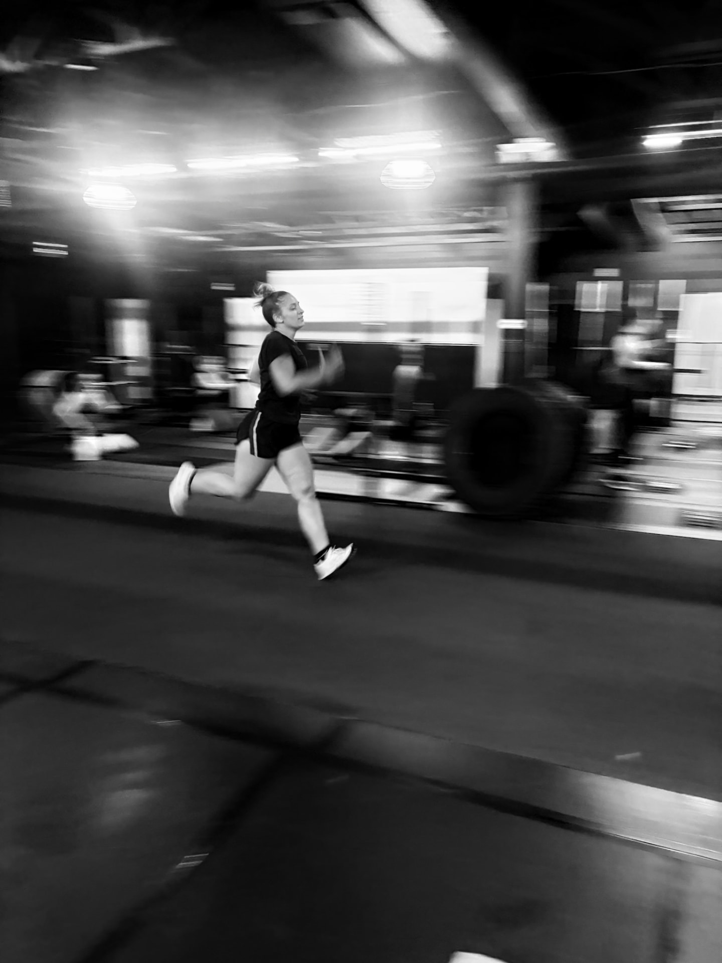 Fitness Artist member running during a conditioning session