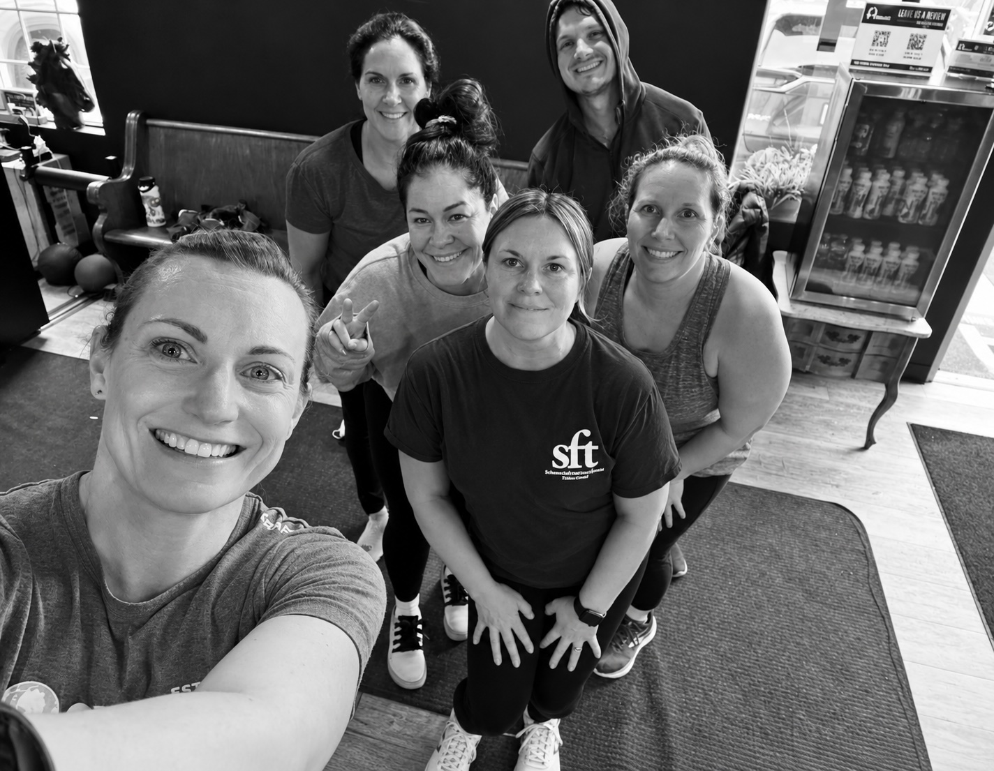 Fitness Artist members smiling together for a group photo after a session